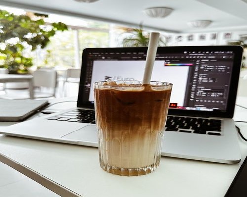 Working from a cafe in Naples with bright daylight